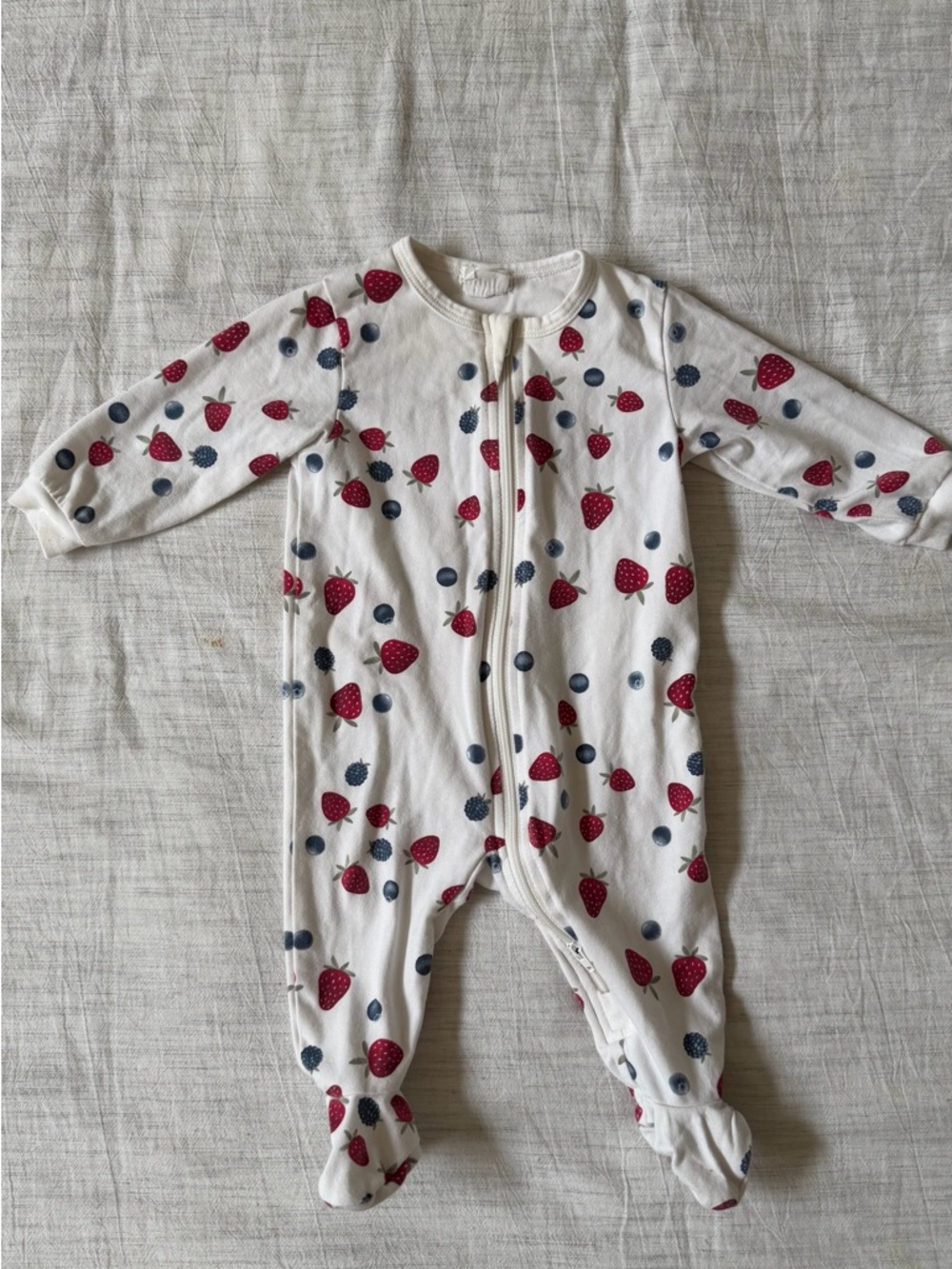 Firsts by Le Petit Lem Cream Footed One-Piece with Strawberry and Blueberry